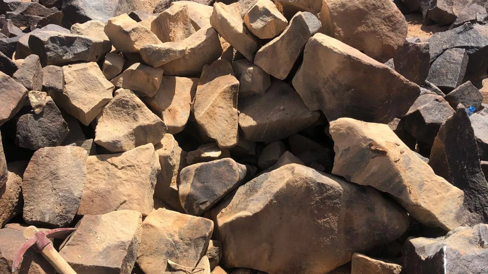 Inscripted stones on sand