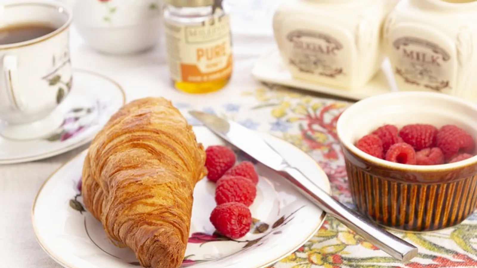 image of croissant, berries, tea
