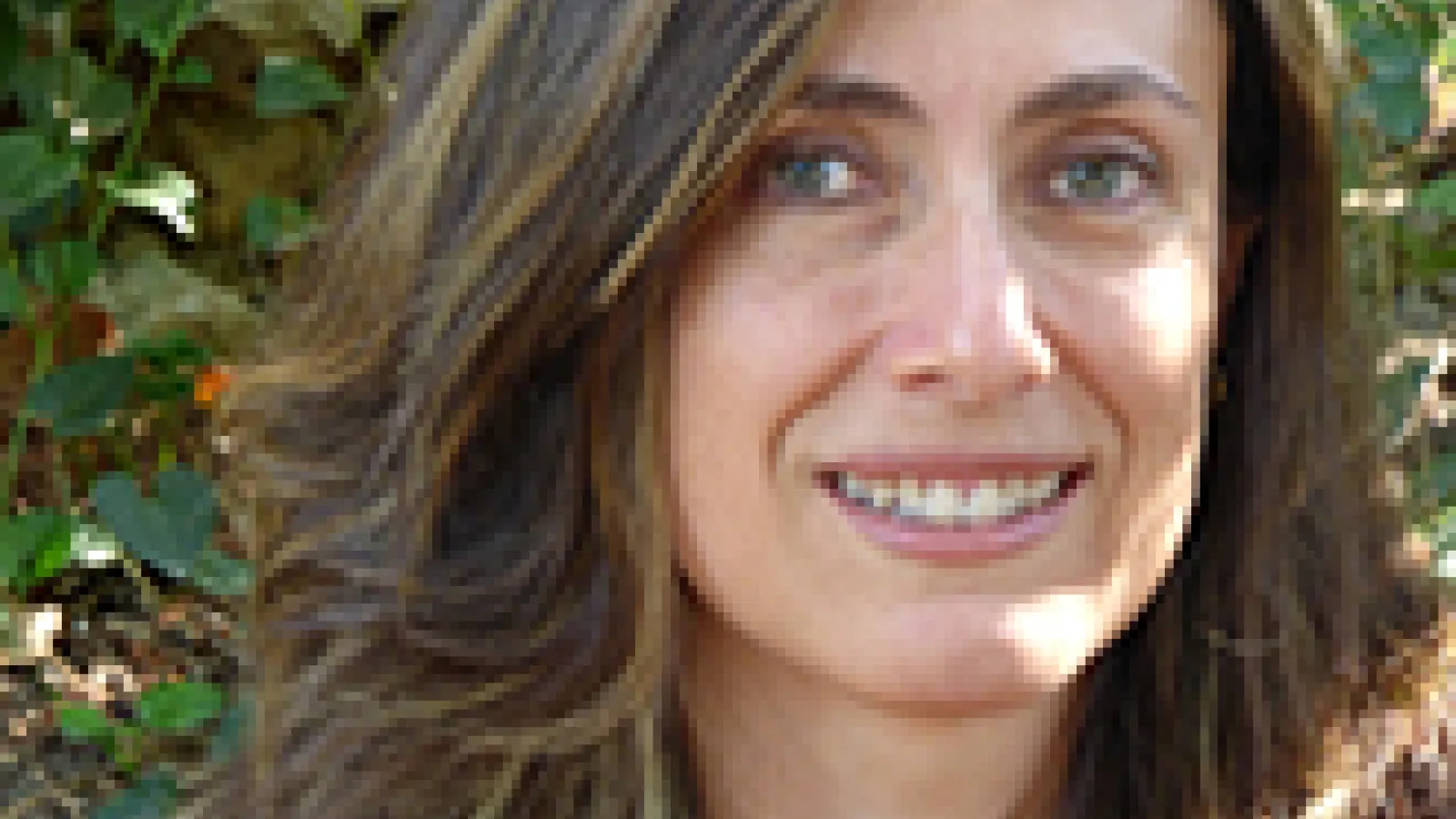 Headshot photograph of Carolina Lopez-Ruiz