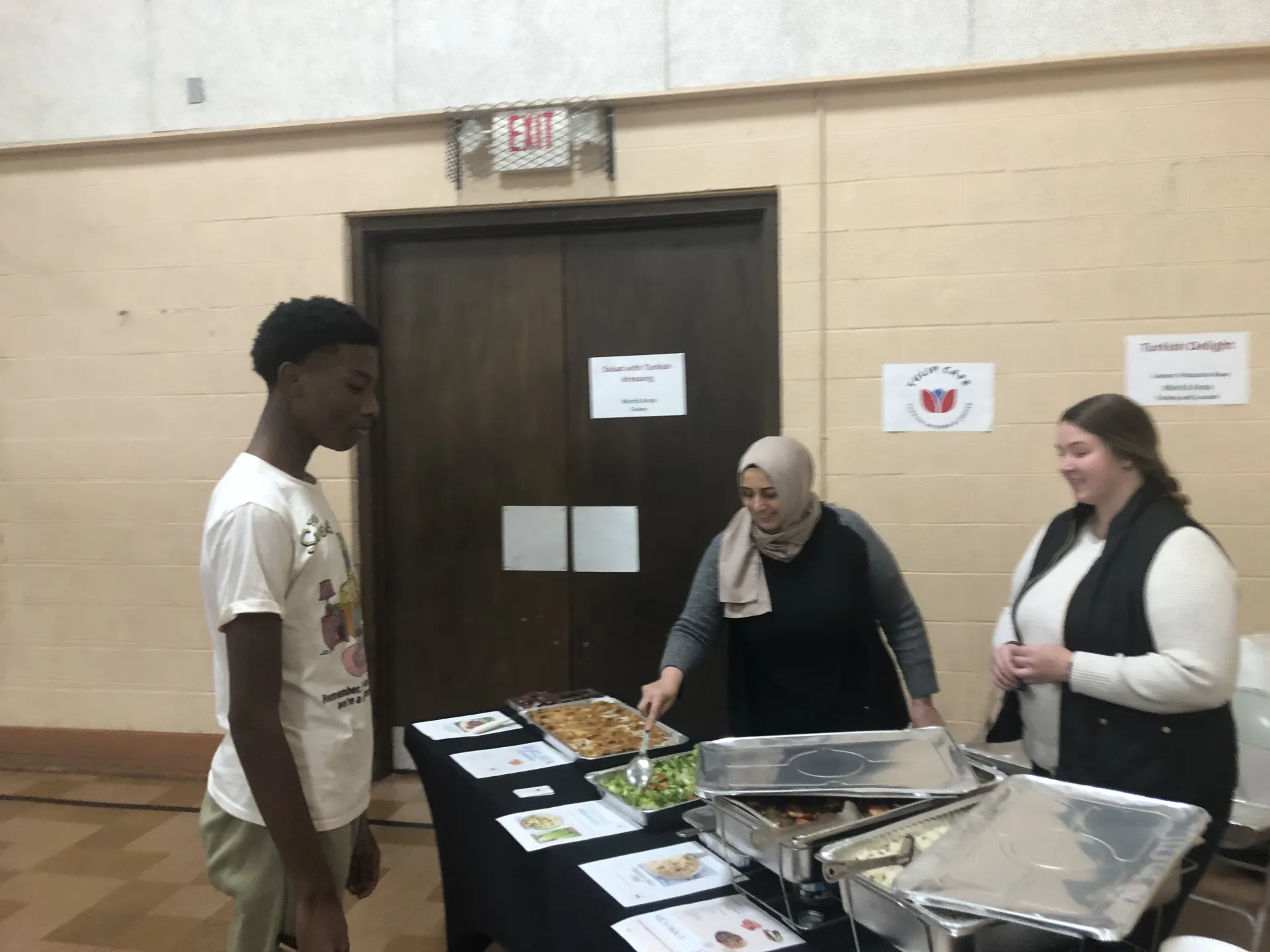 student being served Levantine specialities 