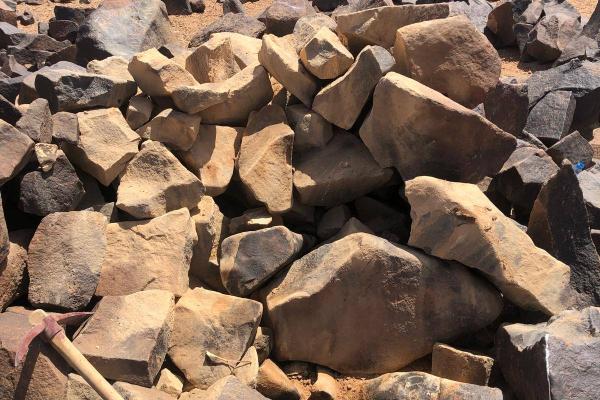 Inscripted stones on sand